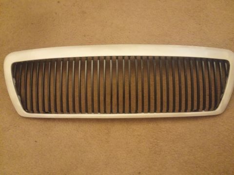 2000 Mercury Grand Marquis - Grille from a 2000 Mercury Grand Marquis, likely for replacement.