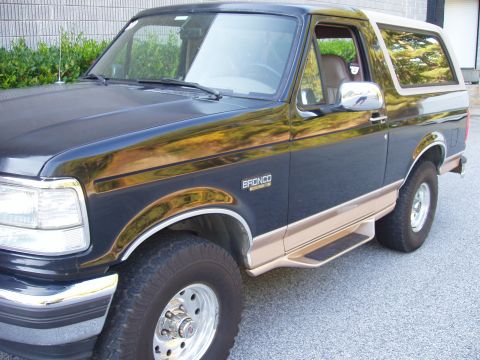 1996 Ford Bronco - This 1996 Ford Bronco features a two-tone paint scheme with chrome accents.