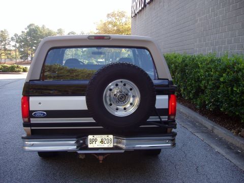 1996 Ford Bronco - This 1996 Ford Bronco is shown from the rear, a spare tire mounted on the tailgate and a Georgia license plate.