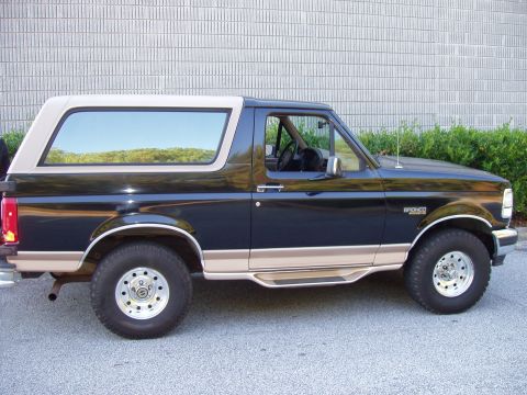 1996 Ford Bronco - This 1996 Ford Bronco is shown from the side, its two-tone paint scheme and removable hardtop.