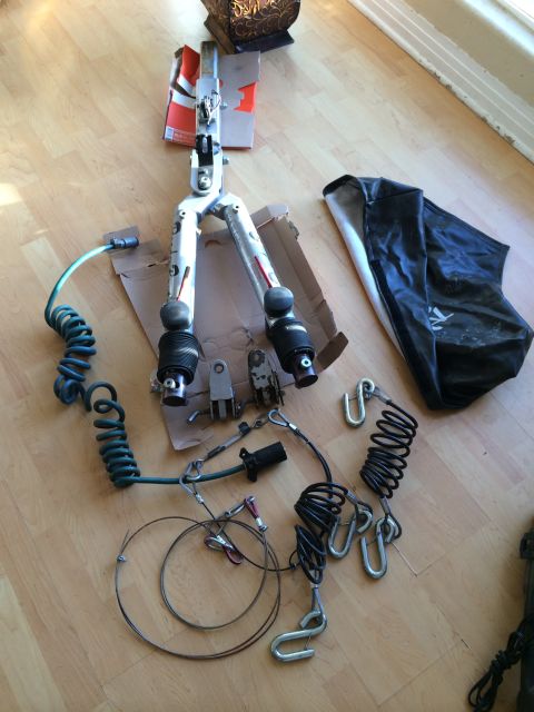 2003 Honda CR-V - Collection of tow bar equipment laid out on a wooden floor.