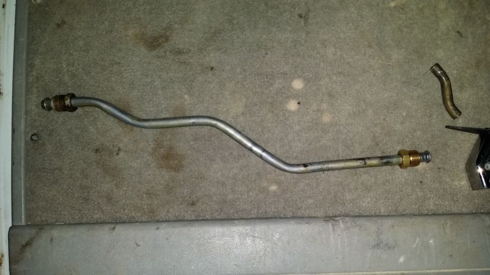 Cut and flared stock fuel line. We did not have the fittings; buddy misunderstood about what end I needed so I'll have my adapter fittings from Summit tomorrow.