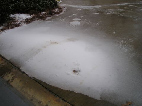 1996 Ford Bronco - An icy patch of ground with snow and debris is visible, along with the Supermotors.net logo.