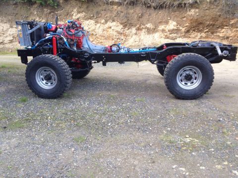 1993 Ford Bronco - The frame and powertrain of a vehicle are shown, with the body removed.