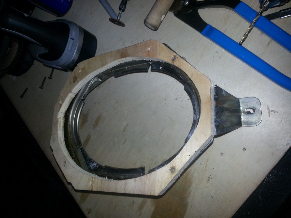 Photo of a plywood speaker mounting ring on a workbench