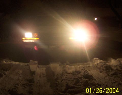1991 Ford Crown Victoria LTD - Comparison of H4 and stock light from outside car