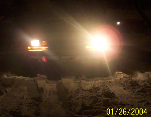 Comparison of H4 and stock light from outside car