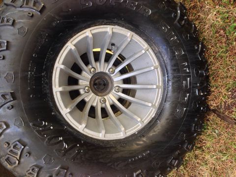 1979 Ford Bronco - This image shows a close-up of an off-road tire and wheel, not a 1979 Ford Bronco.