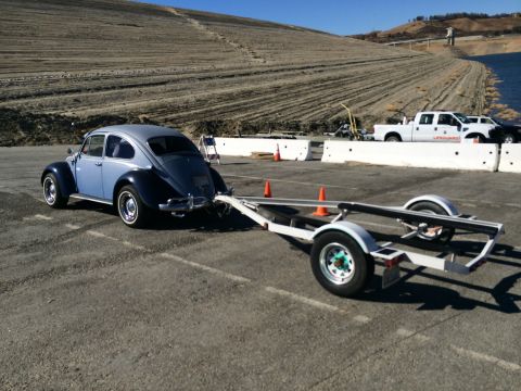 1968 Ford Mustang - Photograph of a Volkswagen Beetle with a boat trailer, not a technical document.