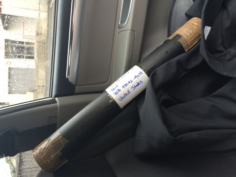 1993 Mazda MX-3 - A shipping label is affixed to a tube, indicating the sender's location as Kent, Washington, United States.