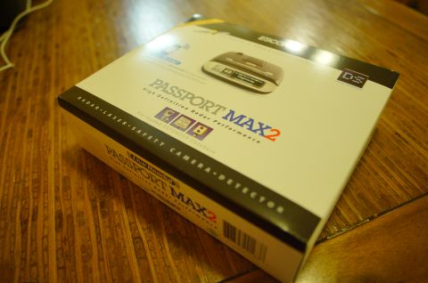 2003 Ford Taurus - The box for a Passport Max2 radar detector is shown on a wooden table.