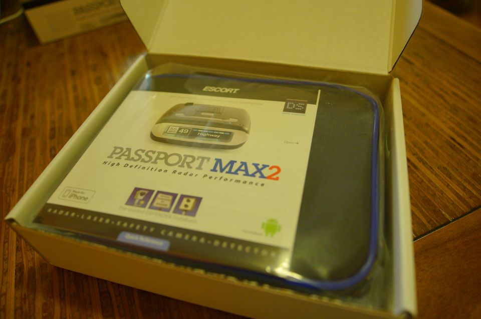 Escort Passport Max2 radar detector in box, showing "High Definition Radar Performance" text and icons