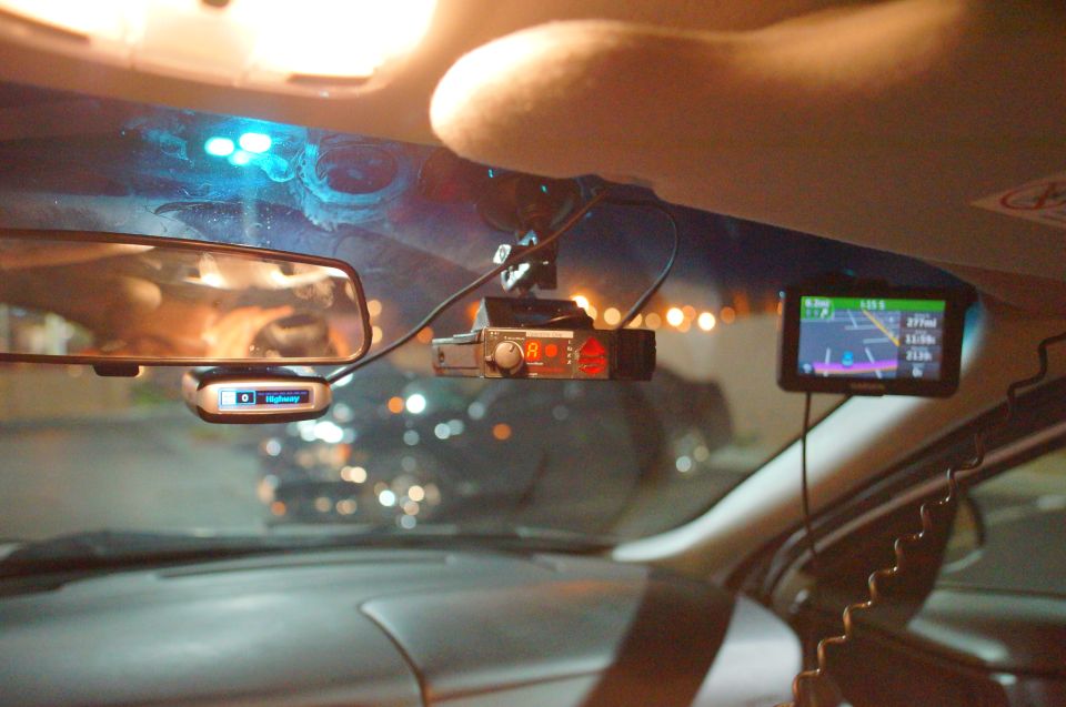 Radar detector and GPS mounted on windshield