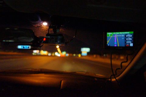 2003 Ford Taurus - Driving at night with a GPS showing the route to San Bernardino and a radar detector.
