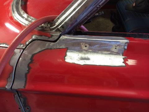 1964 Ford Fairlane - Bodywork in progress on a 1964 Ford Fairlane, showing metal repair on the door panel.