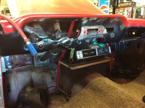 1964 Ford Fairlane - Interior view of a 1964 Ford Fairlane dashboard during restoration, an aftermarket AC unit.