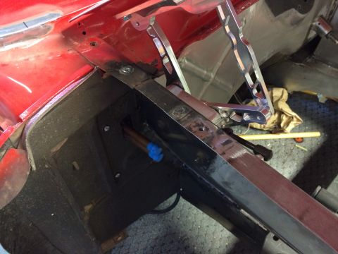 1964 Ford Fairlane - Custom metalwork is being installed on the vehicle's frame.