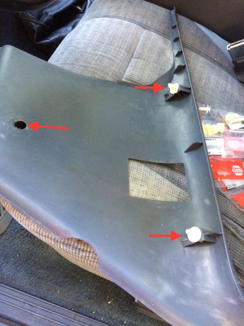 1990 Ford F-150 - Close-up of a gray interior trim panel with red arrows indicating clip locations and a hole.