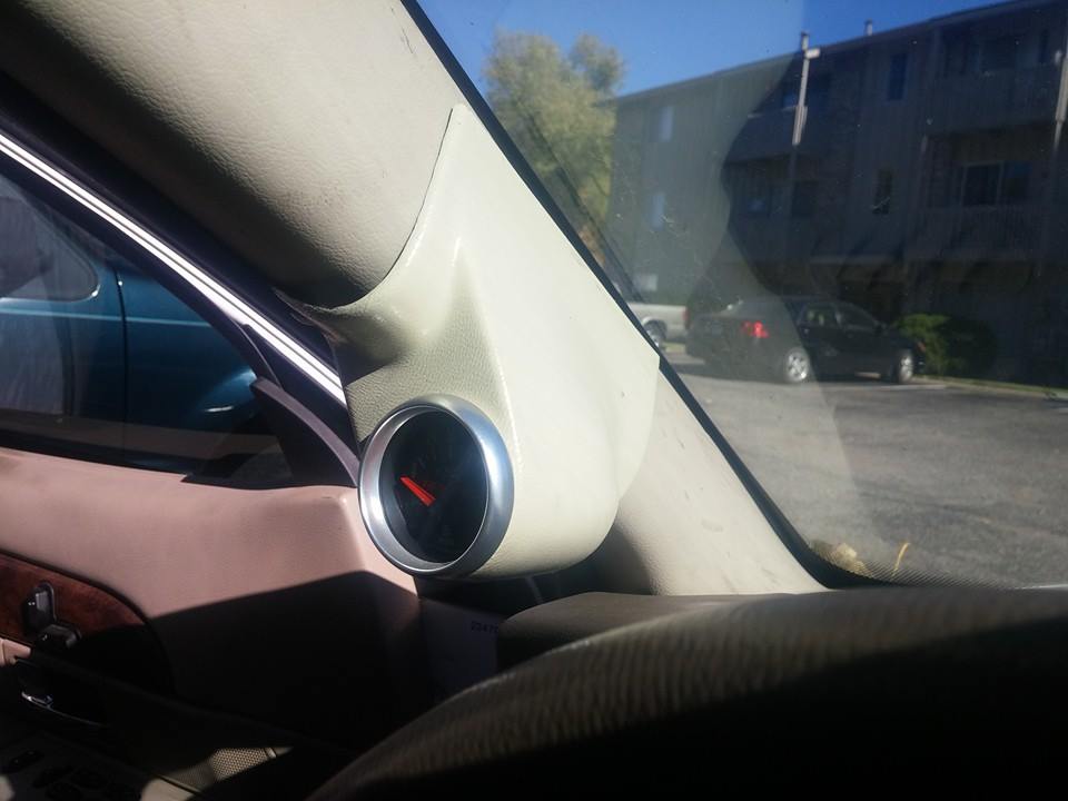 Interior gauge pod with a red-needled meter