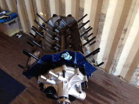 1996 Ford Bronco - Engine block and water pump assembly, ready for further work.