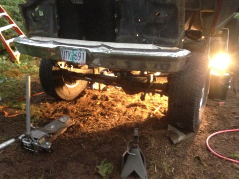 1971 Ford F-250 - The rear view of a truck shows its suspension and bumper, with the license plate UTK 691 visible.