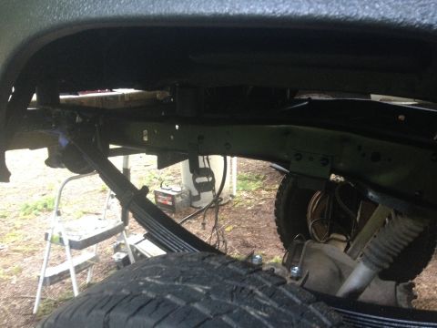 1971 Ford F-250 - Underside view of the frame and suspension components on a 1971 Ford F-250.