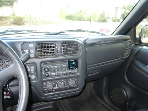 2001 Ford Crown Victoria - Interior view of a vehicle's dashboard, showing the radio and air vents.