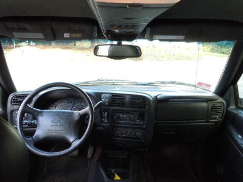2001 Ford Crown Victoria - Interior view of a Chevrolet Blazer, showing the dashboard and steering wheel. The registry claim of a 2001 Ford Crown Victoria is incorrec…