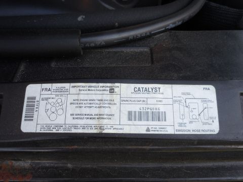 2001 Ford Crown Victoria - This diagram shows the emissions hose routing for a General Motors vehicle, including spark plug gap specifications.