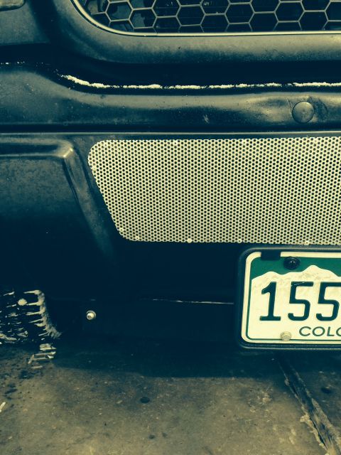 2001 Ford Ranger - Close-up of a vehicle's front bumper and license plate.
