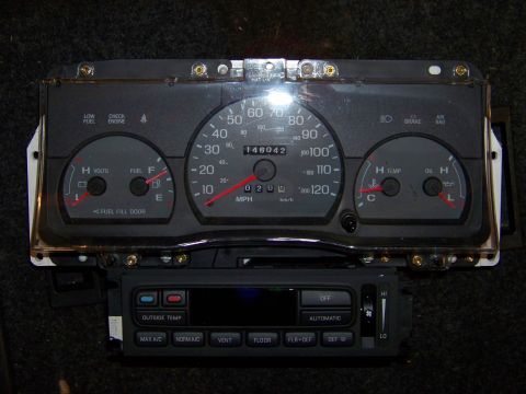 1999 Mercury Grand Marquis - This instrument cluster and climate control unit is a part from a vehicle, not a complete car.