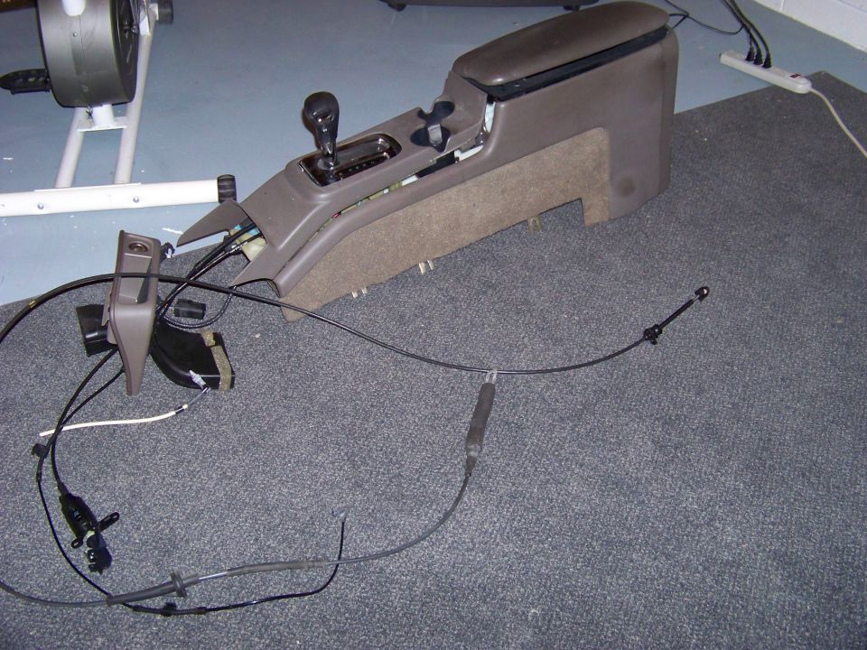 Center console with gear shifter and wiring