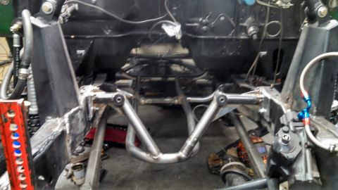 1967 Ford F-250 - Custom front suspension and steering components are visible in this close-up view.