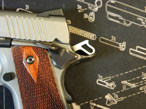 1979 Ford Bronco - A pistol's trigger and grip are shown on a gun schematic diagram.