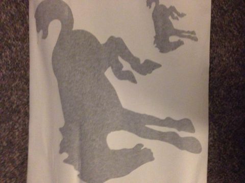 1979 Ford Bronco - A decal a leaping horse is shown, with a smaller horse silhouette in the background.