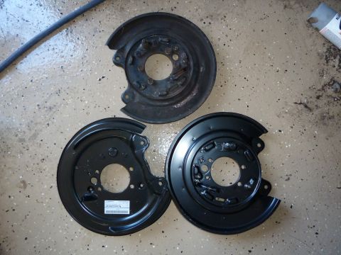 2007 Subaru Impreza - old and new dust shields/e-brake mounting/caliper mounting plates