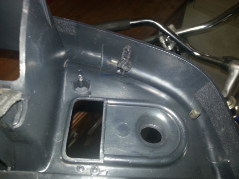 1994 Ford Bronco - Photograph of a close-up detail of a vehicle dash bezel underside, not a technical document.