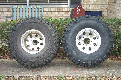 1995 Ford Bronco - On the left is a 36x14.50/15 MT Baja Belt on a 15x12 589 alloy wheel. It's about 90 percent tread and is 35" high and weighs 91 lbs. On the…