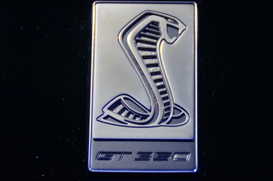 Silver Ford Mustang Shelby GT350 emblem with cobra logo