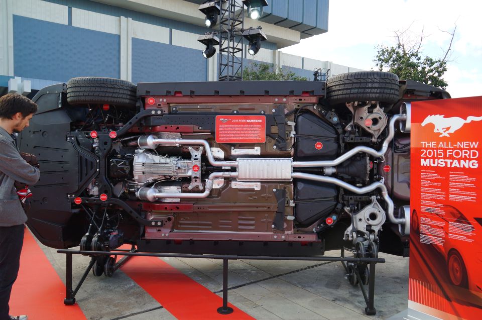 Underside of a 2015 Ford Mustang, showing drivetrain and exhaust.