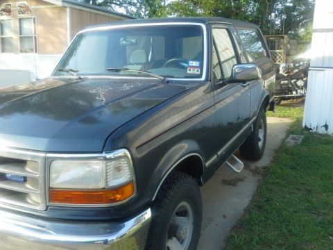 1993 Ford Bronco - This 1993 Ford Bronco is shown from the front three-quarter view, parked outdoors.