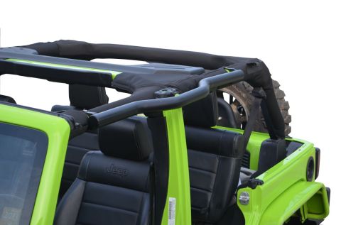 1979 Ford Bronco - Interior view of a green Jeep Wrangler with black leather seats and a black soft top frame.