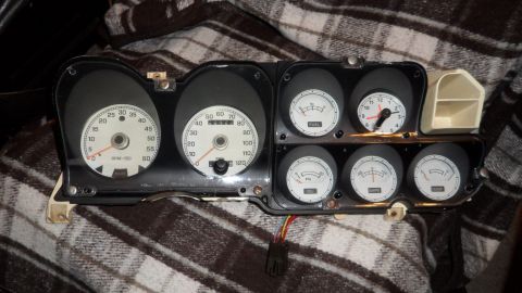 1972 Ford Ranchero - This instrument cluster features multiple gauges and a clock.