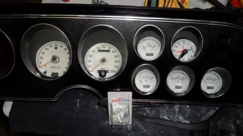 1972 Ford Ranchero - Dashboard gauges including speedometer and tachometer, with a clock and other indicators.