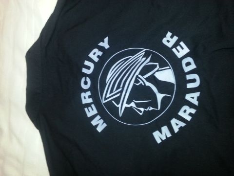 2003 Mercury Marauder - Black fabric displays the Mercury Marauder emblem and name.