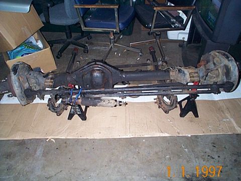 1981 Ford Bronco - This is a front axle assembly, likely from a truck or SUV, shown disassembled.