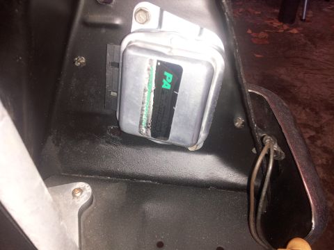 1976 Ford Ranchero - Close-up of an electrical part with visible text and wiring, likely from a vehicle's electrical system.