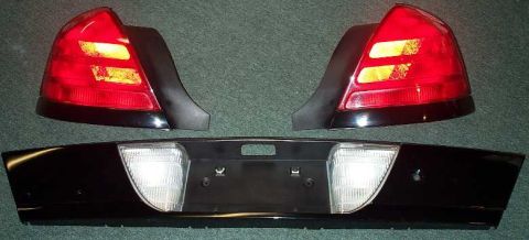 1998 Ford Crown Victoria - The gloss black fascia and solid red taillamps from a 2001 P71.