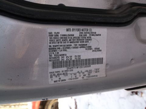 1974 Dodge Challenger - Vehicle identification sticker shows manufacture date of December 2001 and VIN.