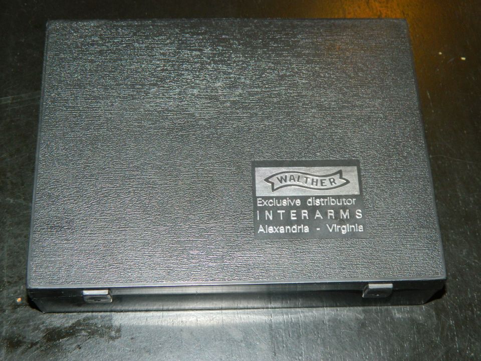 Black gun case with Walther and Interarms logos